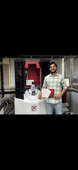 Kshitij at the SQUID/PPMS magnetometer